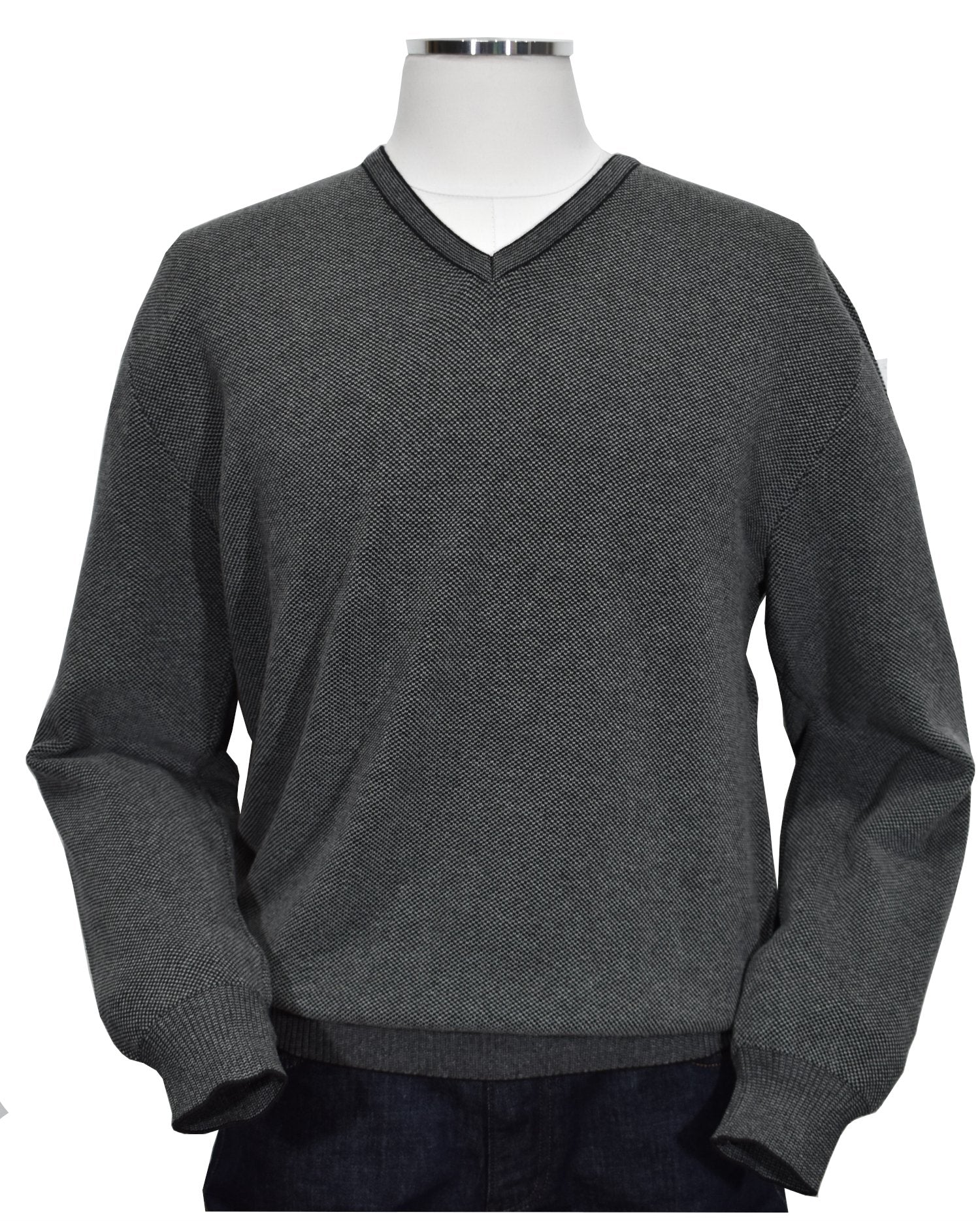 For something timeless and classic, look no further than our signature v-neck light layer, made from ultra-soft Italian cotton with a two-color mixed yarn look for added depth. A perfect complement for cool days, boasting classic banded cuffs and a waist band as well as a comfortable fit.   Italian Popcorn Stitch Sweater by Marcello.