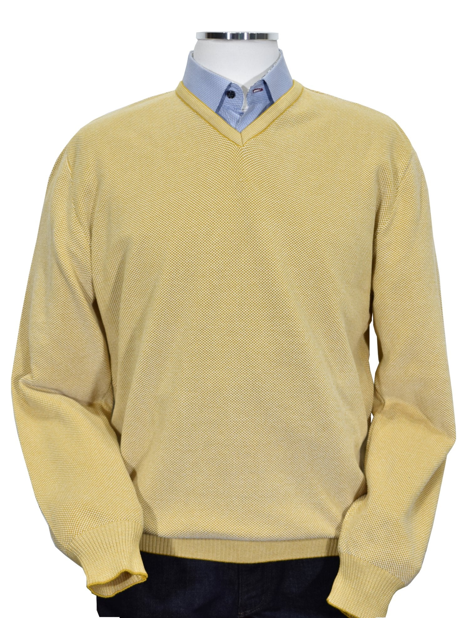 For something timeless and classic, look no further than our signature v-neck light layer, made from ultra-soft Italian cotton with a two-color mixed yarn look for added depth. A perfect complement for cool days, boasting classic banded cuffs and a waist band as well as a comfortable fit.   Italian Popcorn Stitch Sweater by Marcello.