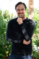 Marcello 921 black sweater with contrast sleeve details.