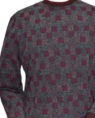 Unique chalet wine melange Marcello Jacquard Sweater - a perfect blend of cotton, viscose, and microfiber that creates a lightweight, soft knit for ultimate comfort and stretch. Its unique mixture of charcoal melange and wine tones, along with a stylish abstract grid pattern, will elevate any outfit. 