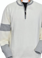 Stay comfortable and stylish with the Marcello 908 Athens Quarter Zip. With soft cotton blended yarn and a medium weight design, this quarter zip offers a cozy fit. The crisp ivory body and silver detailing, along with the fashion orange trim inside the neck band, create a sleek and trendy look. 