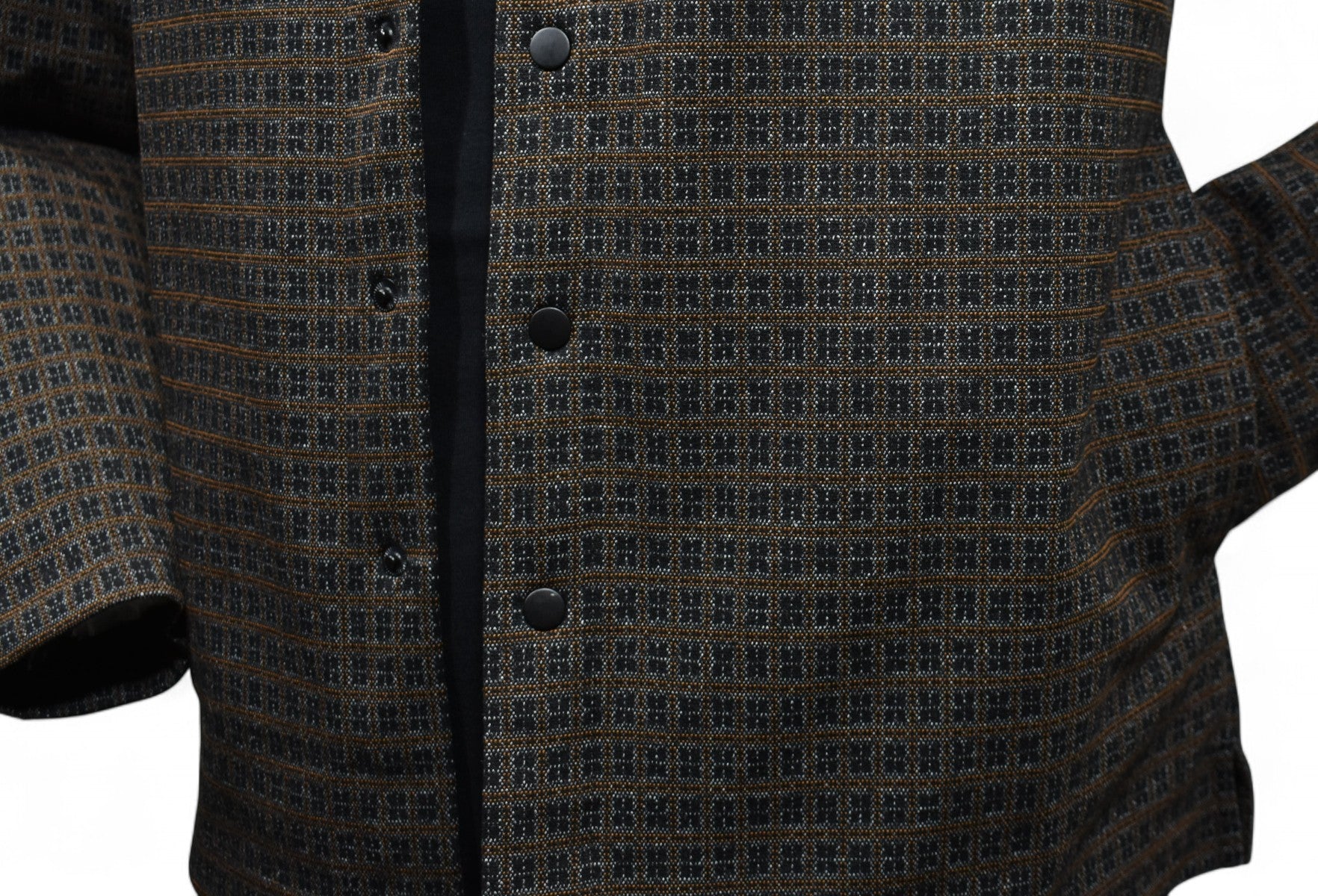 The perfect combination of chocolate and black with a touch of tan in a cool contemporary snap front shacket model by Marcello.