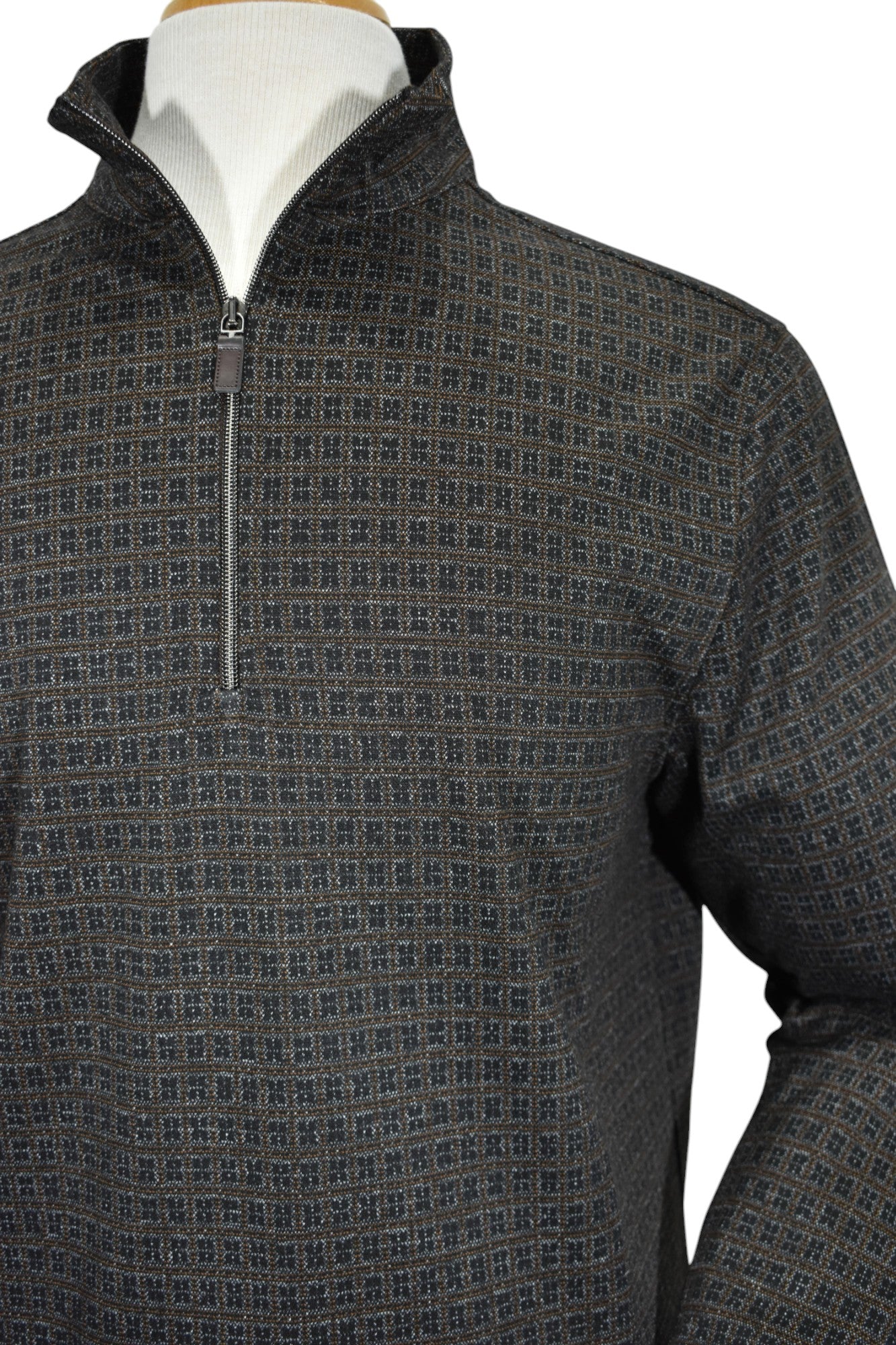 Introducing the Marcello Sasso Quarter Zip - the perfect combination of chocolate and black with a touch of tan.