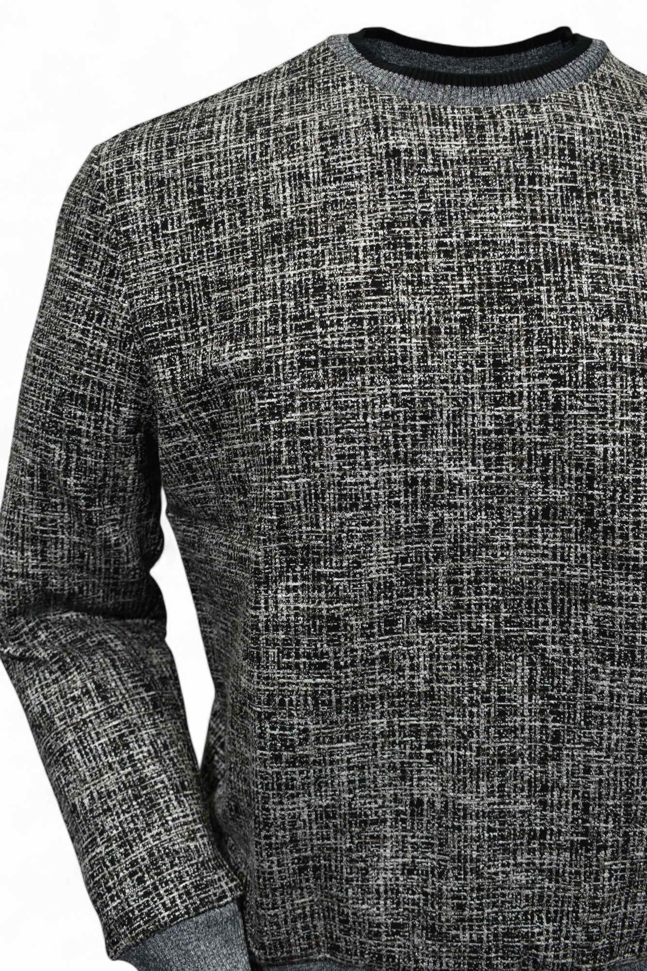 This classic crew neck sweater features a rich combination of tan, ivory, and black, making it the perfect addition to any outfit in the black or tan families.