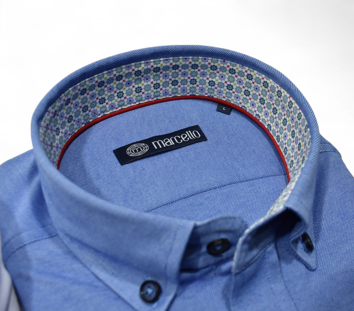 Marcello blue shirt close up.