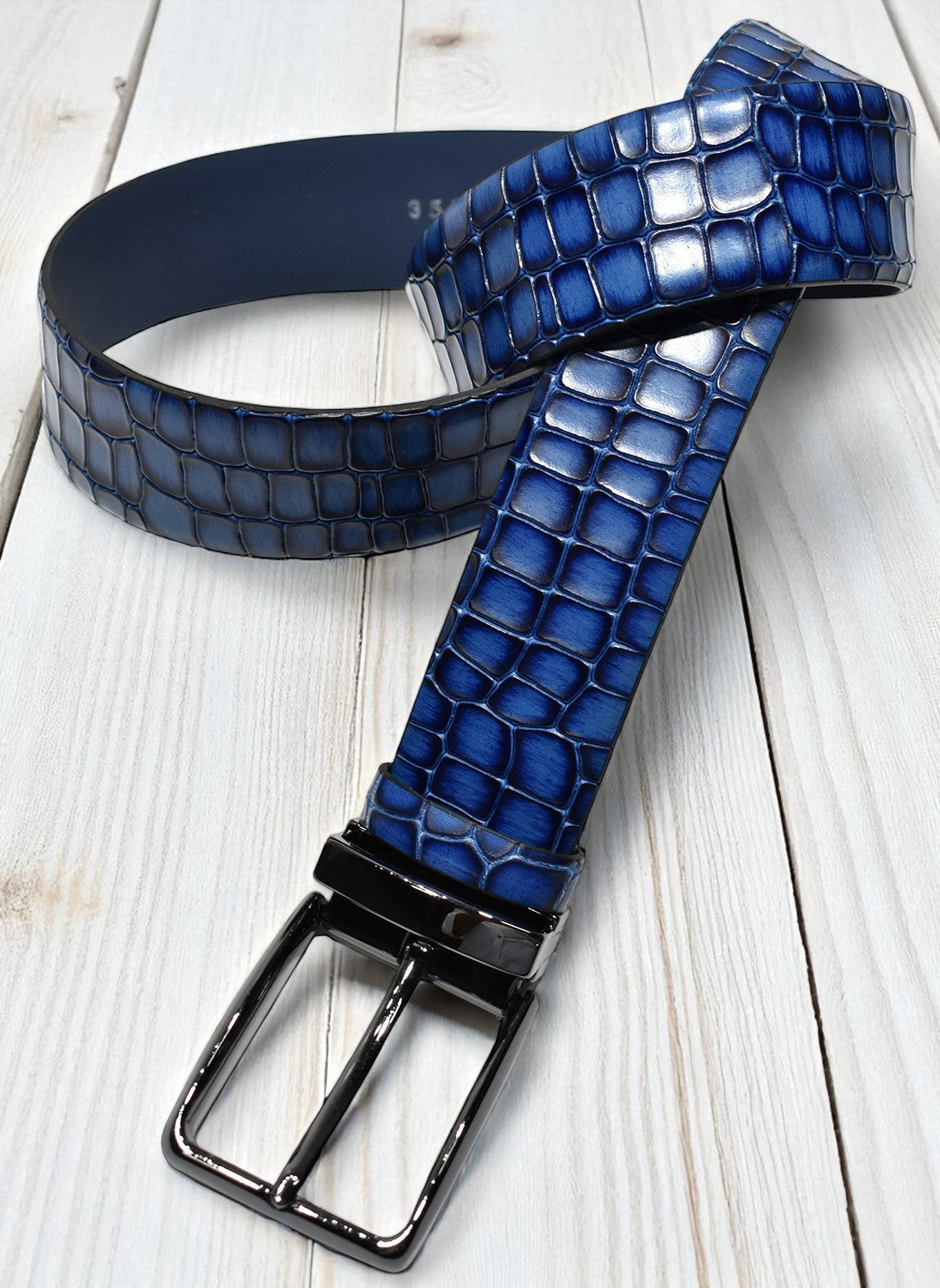 Marcello men's leather stamped croc belt in royal blue. Sizes 30-44