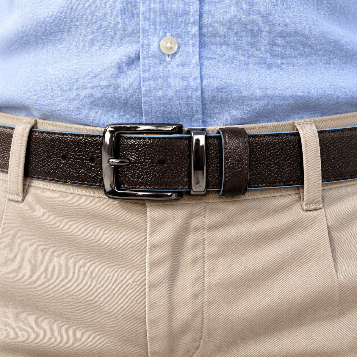 Marcello black leather belt, fine pebble grain, reverse and edges in aqua blue.