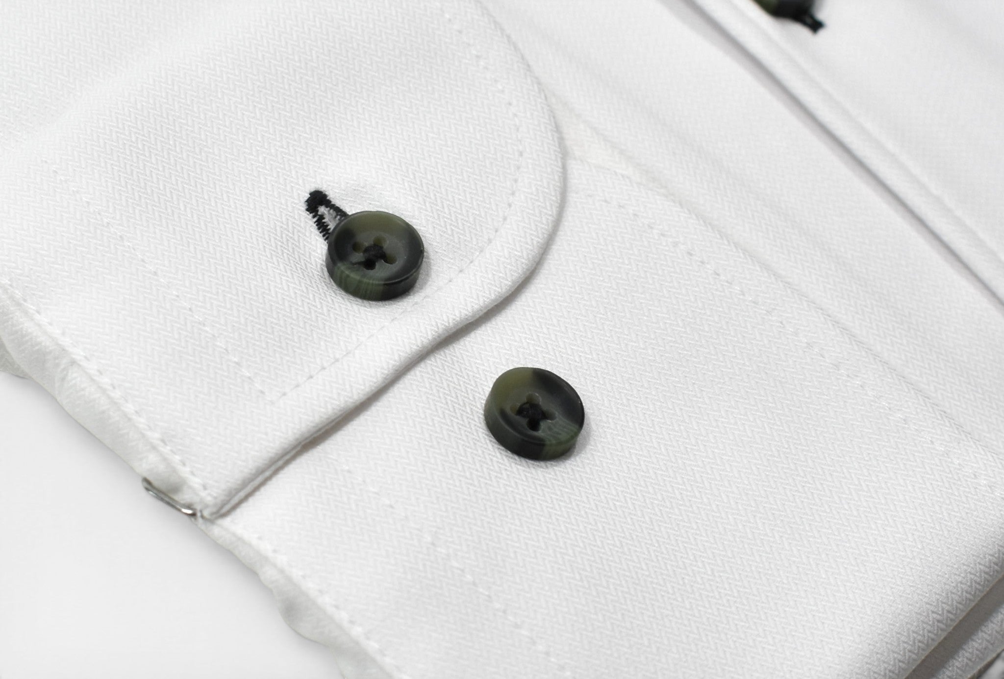 Marcello tonal white shirt custom button.