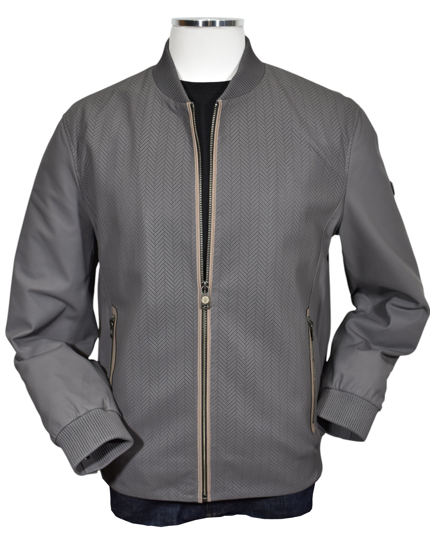 The Marcello Perforated Chevron Leather Coat. Crafted from the finest Italian leather, the hand-stamped chevron pattern adds a touch of sophistication.