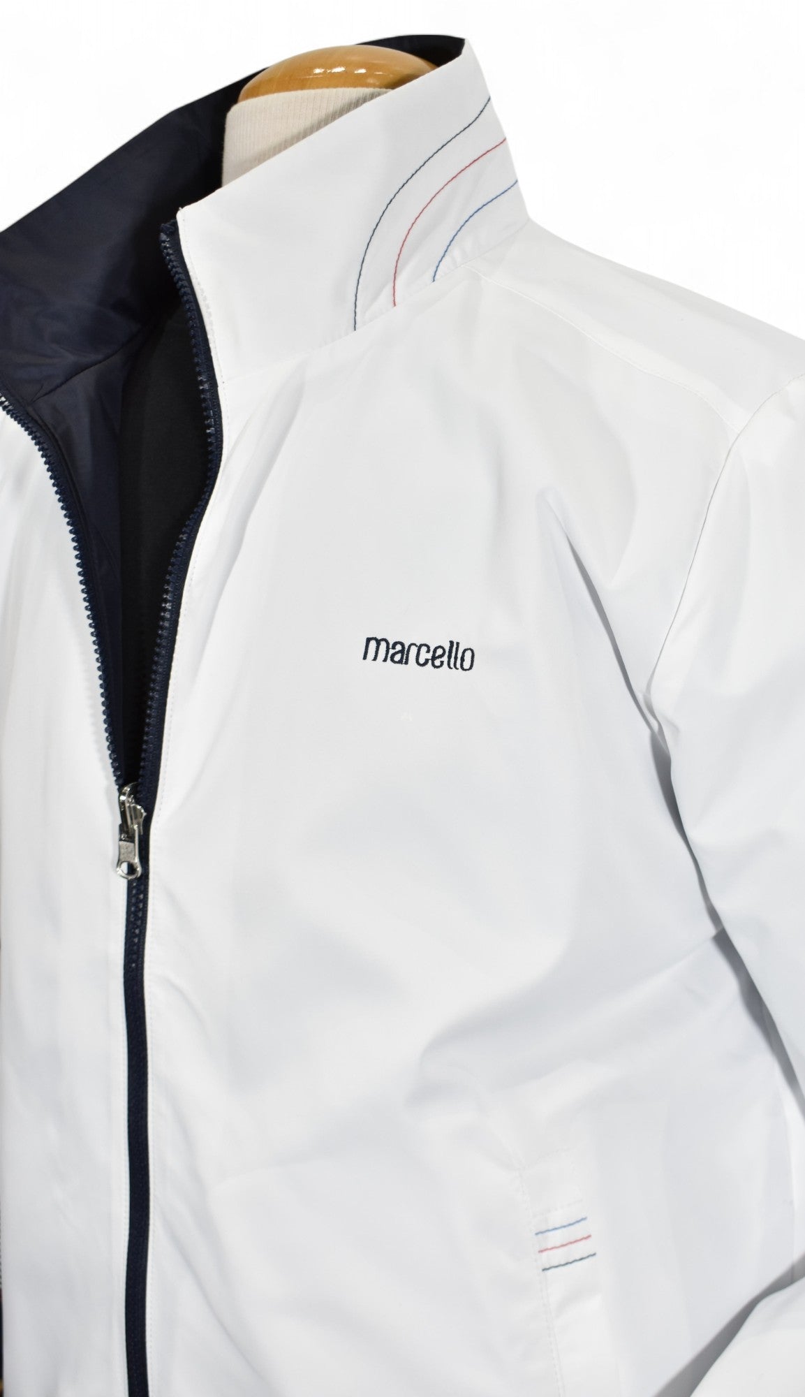 Marcello white windbreaker reversible to navy.