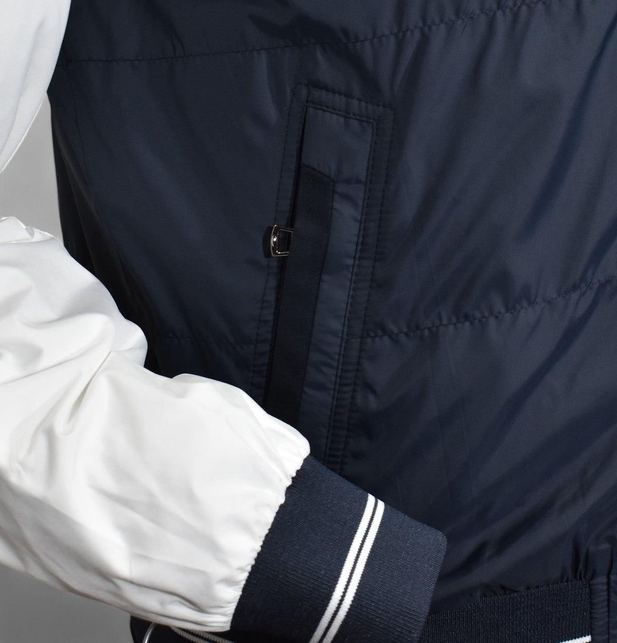 Navy engineered windbreaker with hoodie by Marcello.