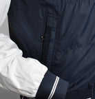 Navy engineered windbreaker with hoodie by Marcello.
