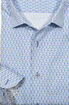 Upgrade your wardrobe with the W020R Indigo Clover Roll Collar. Crafted from extra fine cotton with a luxurious silk-like finish, this shirt is a dream to wear. The Marcello exclusive one-piece roll collar stands elegantly, while the custom matched buttons and trim fabric add a touch of sophistication.