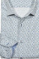 Upgrade your wardrobe with the W021R Pacer Floral Roll Collar. Crafted from extra fine cotton with a luxurious silk-like finish, this shirt is a dream to wear. The Marcello exclusive one-piece roll collar stands elegantly, while the custom matched buttons and trim fabric add a touch of sophistication.