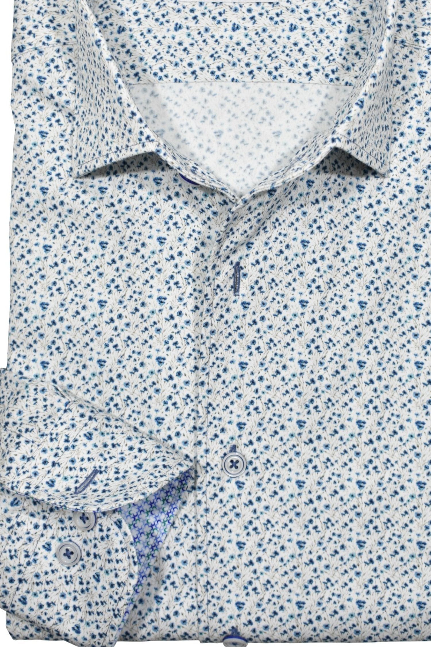 Upgrade your wardrobe with the W021R Pacer Floral Roll Collar. Crafted from extra fine cotton with a luxurious silk-like finish, this shirt is a dream to wear. The Marcello exclusive one-piece roll collar stands elegantly, while the custom matched buttons and trim fabric add a touch of sophistication.