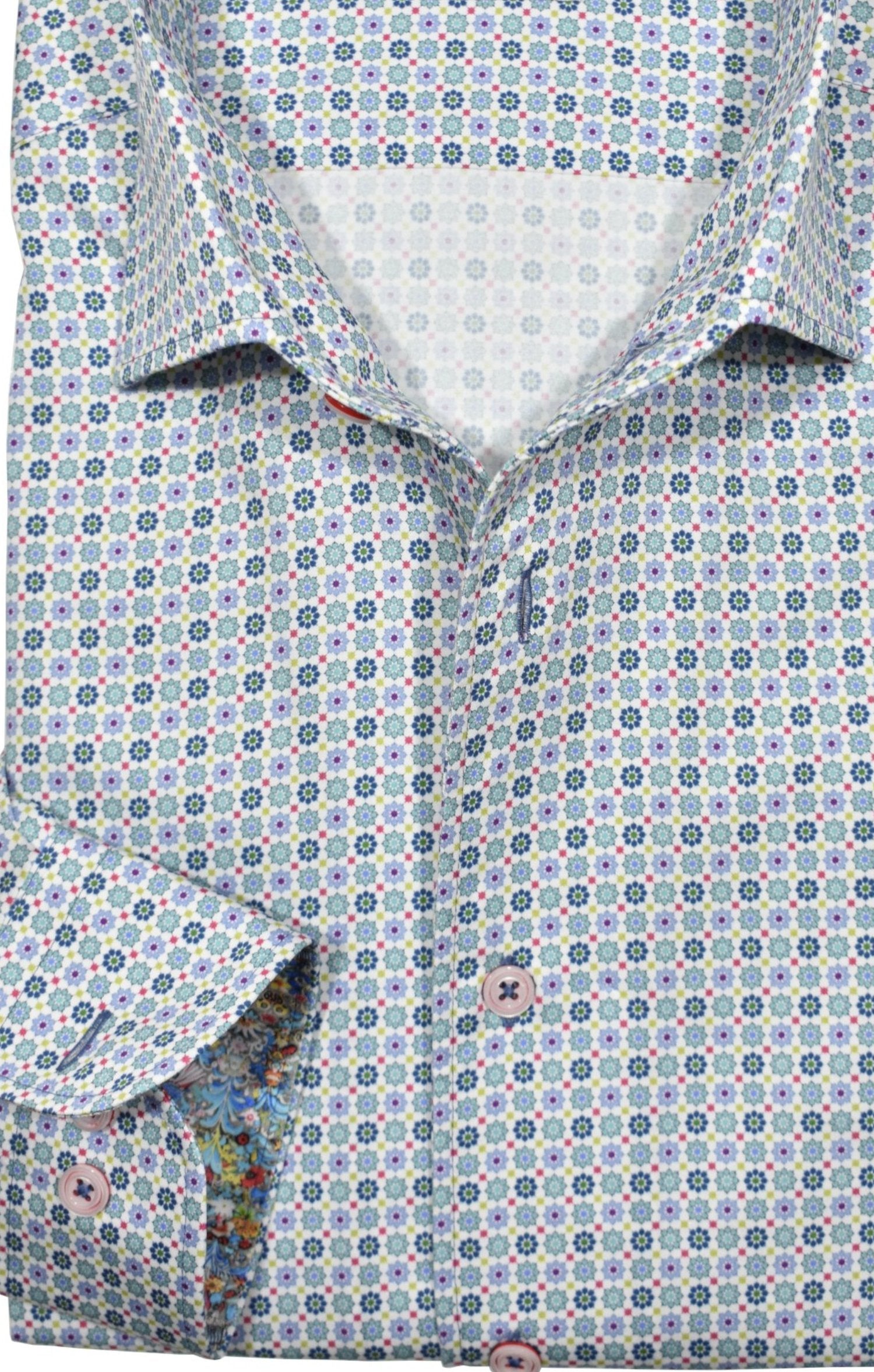 Upgrade your wardrobe with the W022R Seleil Medallion Roll Collar. Crafted from extra fine cotton with a luxurious silk-like finish, this shirt is a dream to wear. The Marcello exclusive one-piece roll collar stands elegantly, while the custom matched buttons and trim fabric add a touch of sophistication.