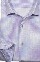 Upgrade your wardrobe with the W028R Plum Stream Roll Collar. Crafted from extra fine cotton with a luxurious silk-like finish, this shirt is a dream to wear. The Marcello exclusive one-piece roll collar stands elegantly, while the custom matched buttons and trim fabric add a touch of sophistication.