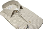 Upgrade your wardrobe with the W031R Tan Andrew Roll Collar. Crafted from extra fine cotton with a luxurious silk-like finish, this shirt is a dream to wear. The Marcello exclusive one-piece roll collar stands elegantly, while the custom matched buttons and trim fabric add a touch of sophistication.