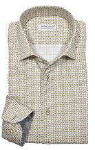 Upgrade your wardrobe with the W031R Tan Andrew Roll Collar. Crafted from extra fine cotton with a luxurious silk-like finish, this shirt is a dream to wear. The Marcello exclusive one-piece roll collar stands elegantly, while the custom matched buttons and trim fabric add a touch of sophistication.