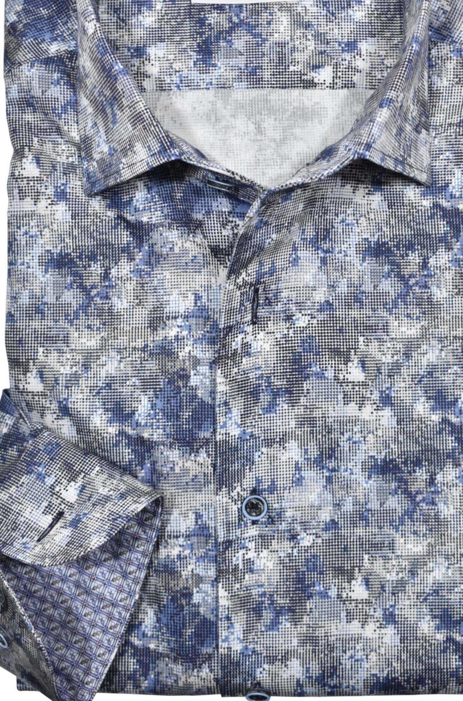 Upgrade your wardrobe with the W034R Nebula Mix Roll Collar. Crafted from extra fine cotton with a luxurious silk-like finish, this shirt is a dream to wear. The Marcello exclusive one-piece roll collar stands elegantly, while the custom matched buttons and trim fabric add a touch of sophistication.