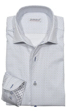 Upgrade your wardrobe with the W035R Rubble Geometric Roll Collar. Crafted from extra fine cotton with a luxurious silk-like finish, this shirt is a dream to wear. The Marcello exclusive one-piece roll collar stands elegantly, while the custom matched buttons and trim fabric add a touch of sophistication.