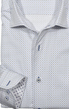 Upgrade your wardrobe with the W035R Rubble Geometric Roll Collar. Crafted from extra fine cotton with a luxurious silk-like finish, this shirt is a dream to wear. The Marcello exclusive one-piece roll collar stands elegantly, while the custom matched buttons and trim fabric add a touch of sophistication.
