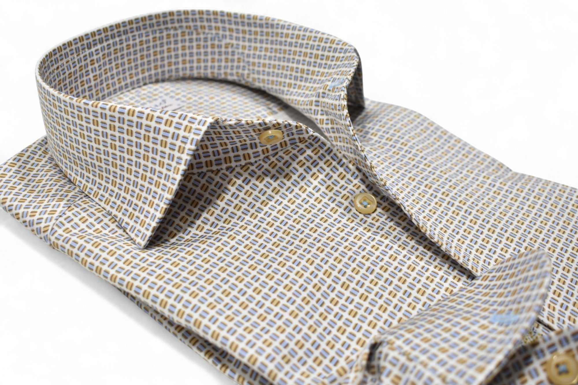 Marcello tans and blue shirt.