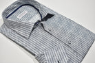 A double stripe atop an abstract static print gives you a fashionable look without going too far. Style it with any denim and you'll be good to go! Boasting a medium-sized collar and a classic shape, this shirt is made with a soft cotton fabric and custom buttons, plus an extra cuff button for a touch of detail.