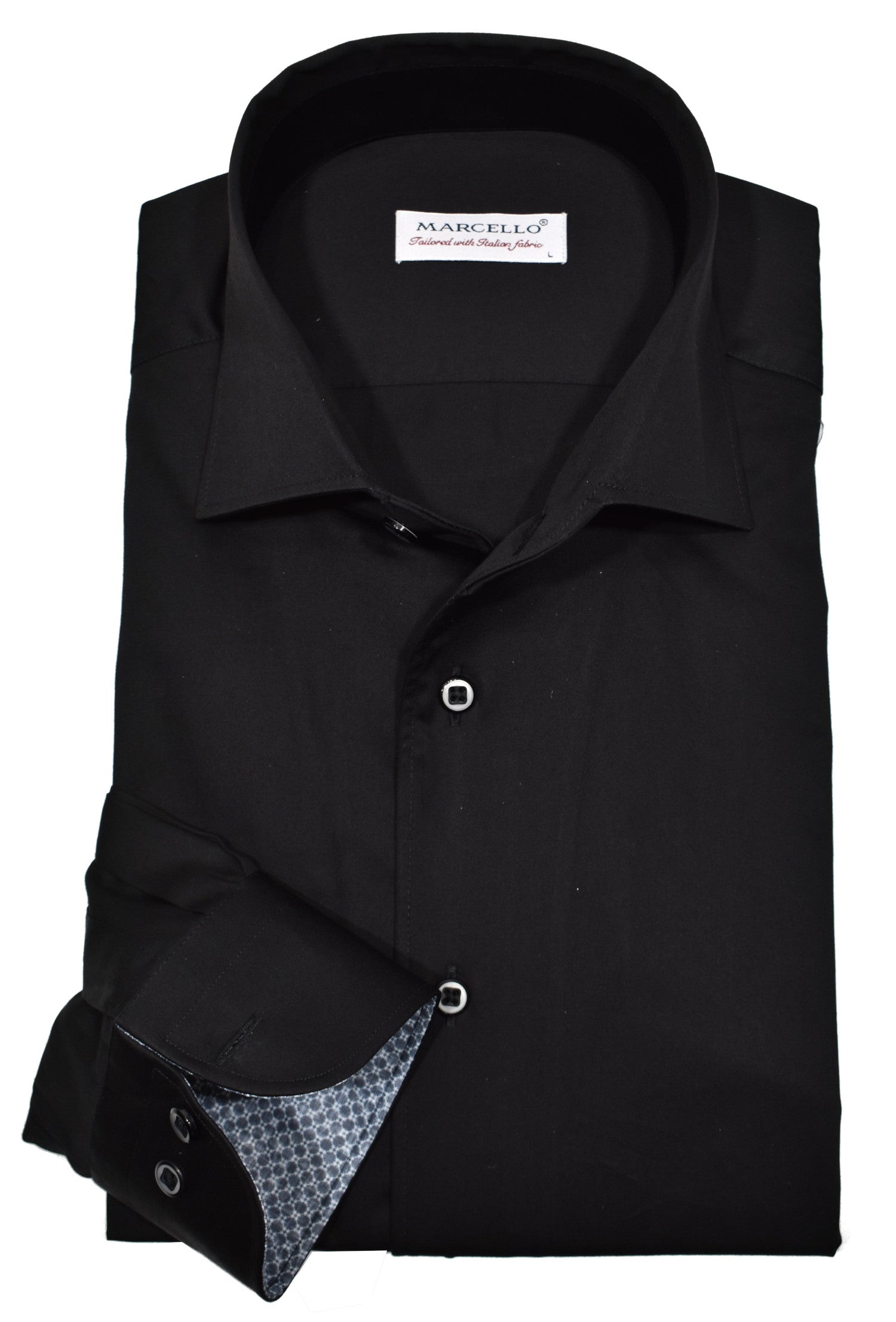 Introducing a wardrobe staple, the Classic Solid Cotton shirt. Made with soft cotton sateen fabric and customized buttons, this shirt exudes sophistication. The medium collar and unique accent trim fabric elevate your style, making a statement in any setting. By Marcello.