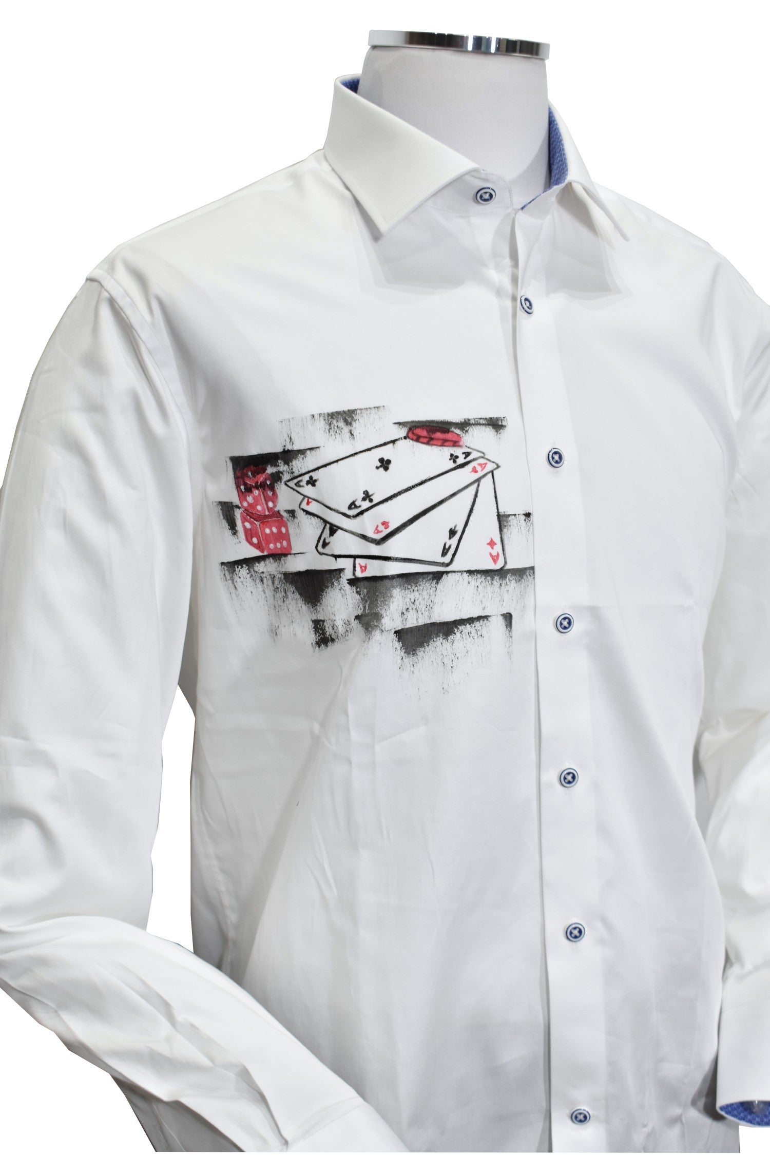 This crisp white shirt features a one-of-a-kind gambling motif, hand-painted by the artist on soft, cotton sateen fabric. Each shirt is unique, making it a truly cool and stylish addition to any wardrobe. The perfect choice for those who want to stand out and make a statement with their fashion. Exclusivey by Marcello.