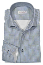 Delicately crafted with a combination of soft cotton fabric and Marcello's signature open roll collar, this piece features a sophisticated clover print in blue, tan and black, as well as custom hand-selected buttons and a timeless silhouette. The neat pattern exudes a fashion statement while remaining truly classic in nature. Classic shaped fit.