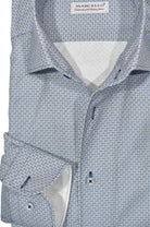 Delicately crafted with a combination of soft cotton fabric and Marcello's signature open roll collar, this piece features a sophisticated clover print in blue, tan and black, as well as custom hand-selected buttons and a timeless silhouette. The neat pattern exudes a fashion statement while remaining truly classic in nature. Classic shaped fit.