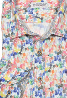 You'll be wowed by the beauty of this abstract print shirt. An array of Spring colors with contrast double track stitch detailing create an unforgettable look. Plus, the matched buttons and contrast neck tape and trim fabric complete the look. Shirt by Marcello.
