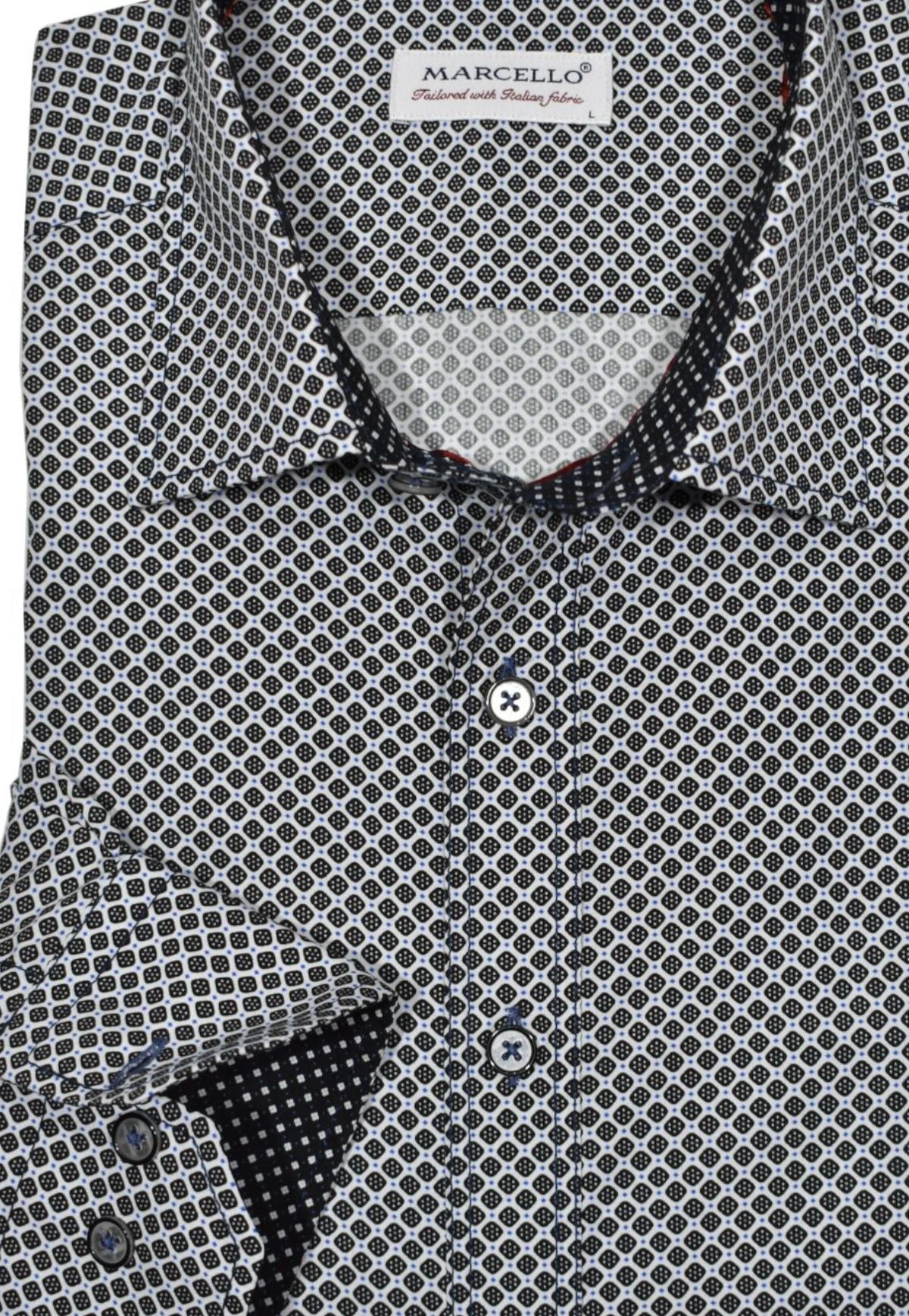 Crafted from soft cotton for an ultra-luxe feel, the unique roll collar stands perfect and looks great alone or under a sport coat. Timeless black and royal dice pattern over a crisp white ground. Elevate your look with contrast stitching, custom buttons and matched trim fabric.  Roll collar shirt by Marcello.