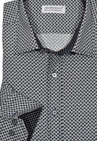 Crafted from soft cotton for an ultra-luxe feel, the unique roll collar stands perfect and looks great alone or under a sport coat. Timeless black and royal dice pattern over a crisp white ground. Elevate your look with contrast stitching, custom buttons and matched trim fabric.  Roll collar shirt by Marcello.