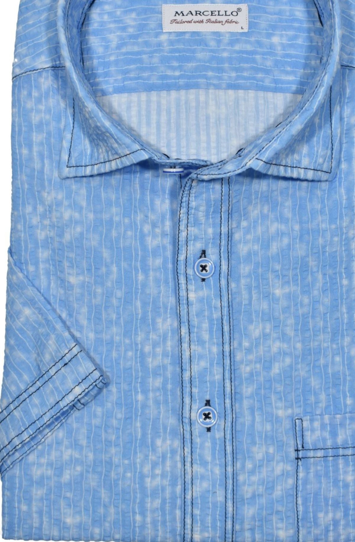 Stay cool and stylish in the W821S Sky Seersucker shirt. Made from lightweight, seersucker fabric, this short-sleeved model comes in a soft blue hue with shades of white. Contrast navy stitching and a classic chest pocket provide the perfect trendy touch, while custom-matched buttons keep you looking sharp.