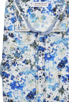 Look effortlessly stylish and sophisticated with this W825S Navy Linen Print. Crafted with a blend of soft cotton and linen, it offers the classic linen look without the wrinkling. Featuring an abstract blue and navy pattern, it's finished with custom buttons, trim fabric and a soft trend collar for an elegant touch. Cotton linen shirt by Marcello.