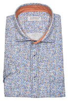 Look effortlessly stylish and sophisticated with this W827S Brushed Abstract Cotton Linen Print. Crafted with a blend of soft cotton and linen, it offers the classic linen look without the wrinkling. Featuring an abstract mango, navy and hint of sky blue pattern, it's finished with custom buttons, trim fabric and a soft trend collar for an elegant touch. Cotton linen shirt by Marcello.