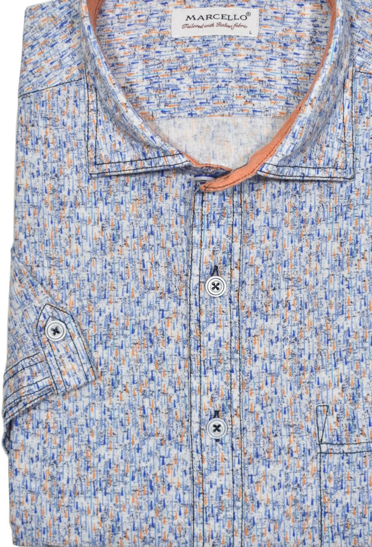 Look effortlessly stylish and sophisticated with this W827S Brushed Abstract Cotton Linen Print. Crafted with a blend of soft cotton and linen, it offers the classic linen look without the wrinkling. Featuring an abstract mango, navy and hint of sky blue pattern, it's finished with custom buttons, trim fabric and a soft trend collar for an elegant touch. Cotton linen shirt by Marcello.