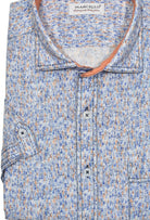 Look effortlessly stylish and sophisticated with this W827S Brushed Abstract Cotton Linen Print. Crafted with a blend of soft cotton and linen, it offers the classic linen look without the wrinkling. Featuring an abstract mango, navy and hint of sky blue pattern, it's finished with custom buttons, trim fabric and a soft trend collar for an elegant touch. Cotton linen shirt by Marcello.