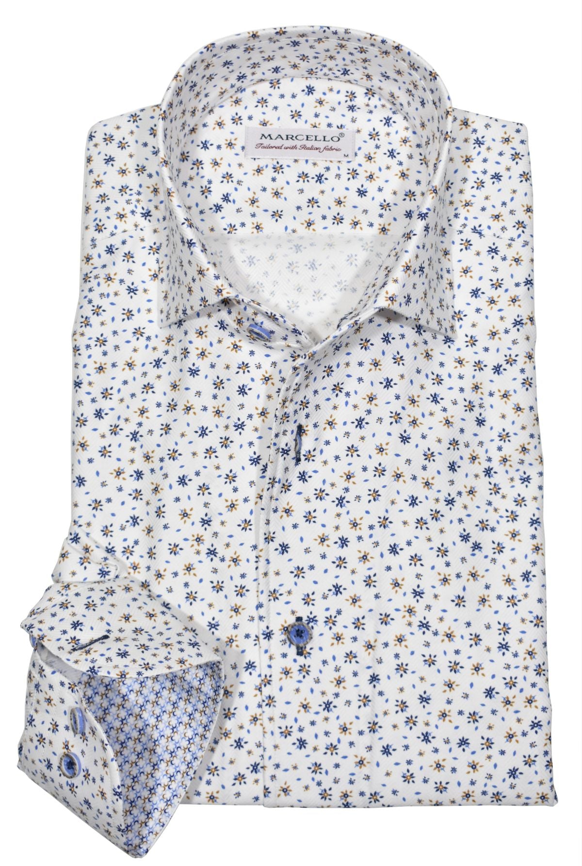 This soft herringbone shirt boasts a subtle micro floral pattern in navy and camel, making it a stylish addition to any wardrobe. Shirt by Marcello.