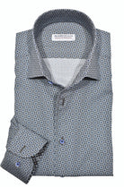 Elevate your style with the fine Sanibel Roll Collar sport shirt. The Marcello one piece roll collar adds a touch of sophistication, while the neat pattern in rich chocolate, ivory, and navy offers a versatile and dressy look. Perfect for wearing alone or under a sport coat, this shirt pairs effortlessly with any colored pants or jeans.