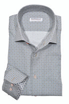 Elevate your wardrobe with the elegant Aspen Classic Roll Collar sport shirt. Featuring an exclusive Marcello one piece roll collar, this soft off-white shirt boasts a rich geometric medallion pattern in warm fall colors. The perfect addition to any outfit, pair it with any bottoms for a chic and stylish look.