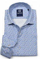 The abstract print of shades of blue with tan accents is soft in nature, yet cool to create a fashion statement. Stretch shirt by Marcello.
