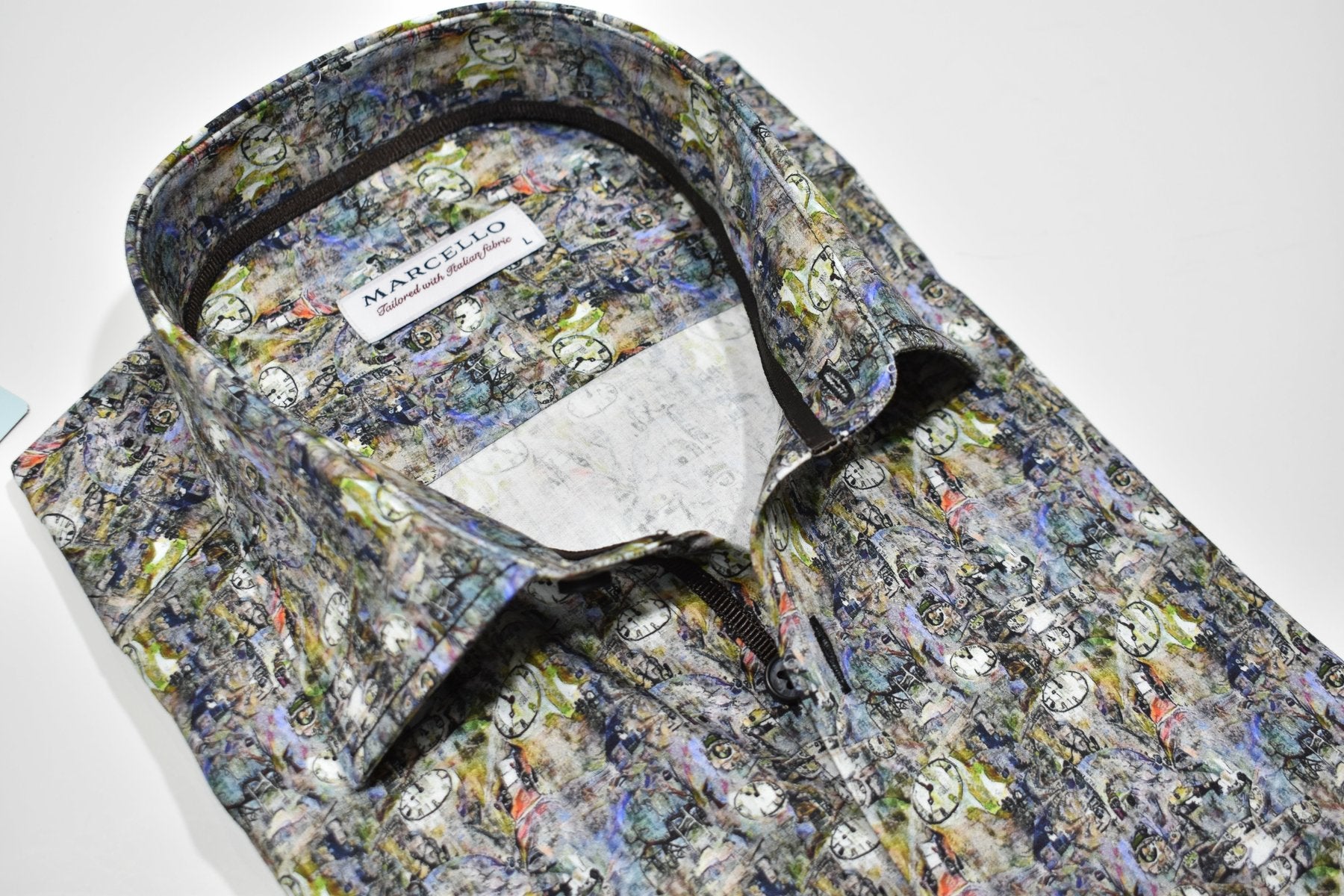Stay comfortable and stylish in the Marcello Dali Clock Sport Shirt. Its cool abstract pattern, resembling a watercolor mix, adds a unique touch to your fall wardrobe. With just the right amount of colors, you'll stand out without looking too dark. Perfect for any casual or unique occasion.