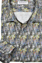 Stay comfortable and stylish in the Marcello Dali Clock Sport Shirt. Its cool abstract pattern, resembling a watercolor mix, adds a unique touch to your fall wardrobe. With just the right amount of colors, you'll stand out without looking too dark. Perfect for any casual or unique occasion.