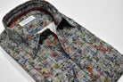 Upgrade your fall wardrobe with the Marcello Autumn Plaid shirt. Its soft gray ground and charcoal-black plaid pattern add a touch of sophistication, while the Autumn leaves overprint adds a pop of color. Perfect for pairing with charcoal or black pants or jeans, this shirt is a versatile and stylish choice for the season.