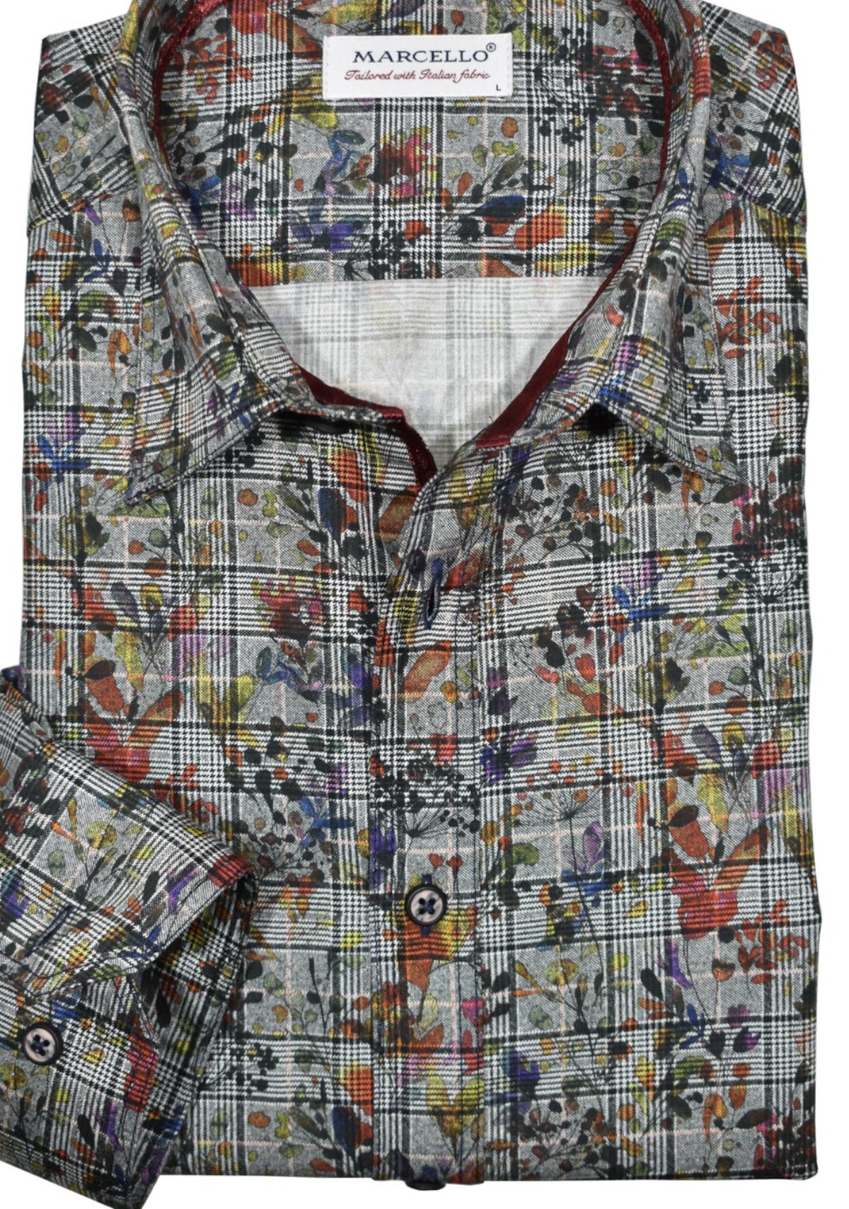Upgrade your fall wardrobe with the Marcello Autumn Plaid shirt. Its soft gray ground and charcoal-black plaid pattern add a touch of sophistication, while the Autumn leaves overprint adds a pop of color. Perfect for pairing with charcoal or black pants or jeans, this shirt is a versatile and stylish choice for the season.