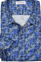 Elevate your casual wardrobe with the Marcello Royal Madras Sport Shirt. The cool shades of royal blue, navy, and gray blend together in a unique madras pattern, perfect for those who love blue. Plus, the contrast double track stitching adds a touch of modern style. Pair with jeans for a casual yet stylish look.
