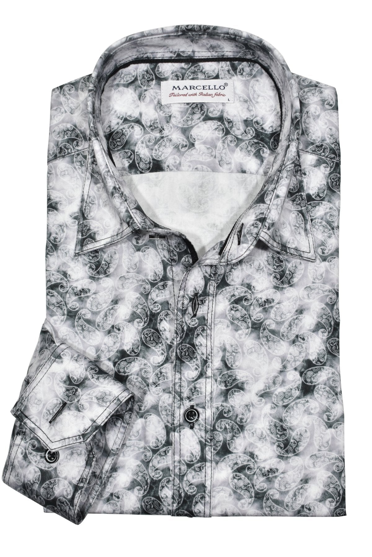 Enhance your contemporary style with the Marcello Slate Paisley. Featuring a unique mix of slate, gray and charcoal tones, and floating white paisleys, this abstract print offers a cool and modern aesthetic.